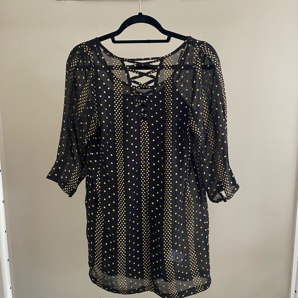 Black dress with gold polka dots
